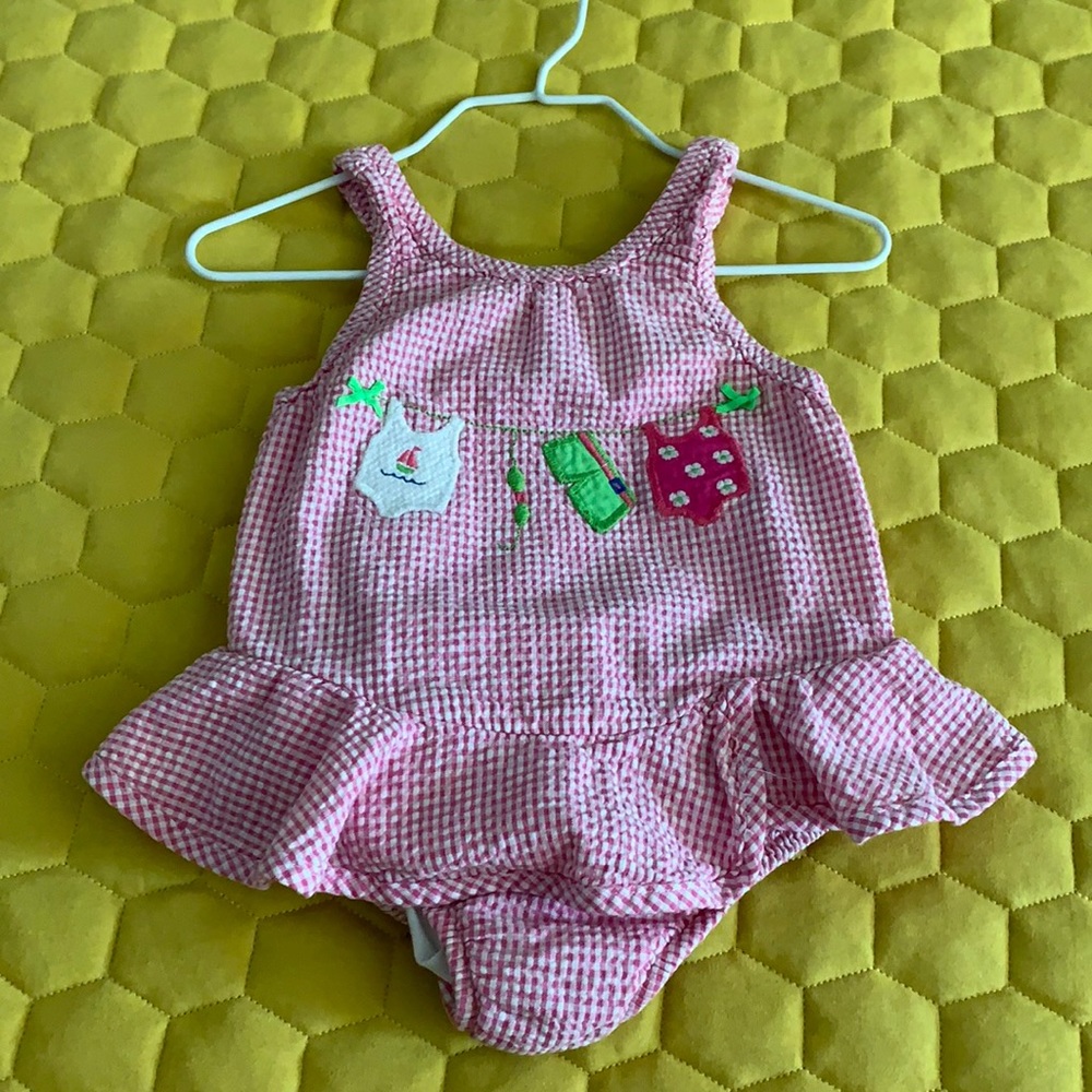 Pink and white bathing suit